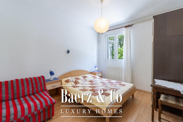 photo 15 Krk, house with three residential units and a large garden in the center