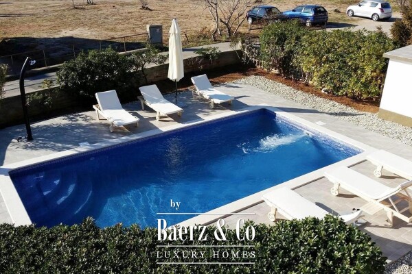 photo 2 Krk, Punat, detached house with two apartments 100 m² each, studio, swimming pool, garage, sauna